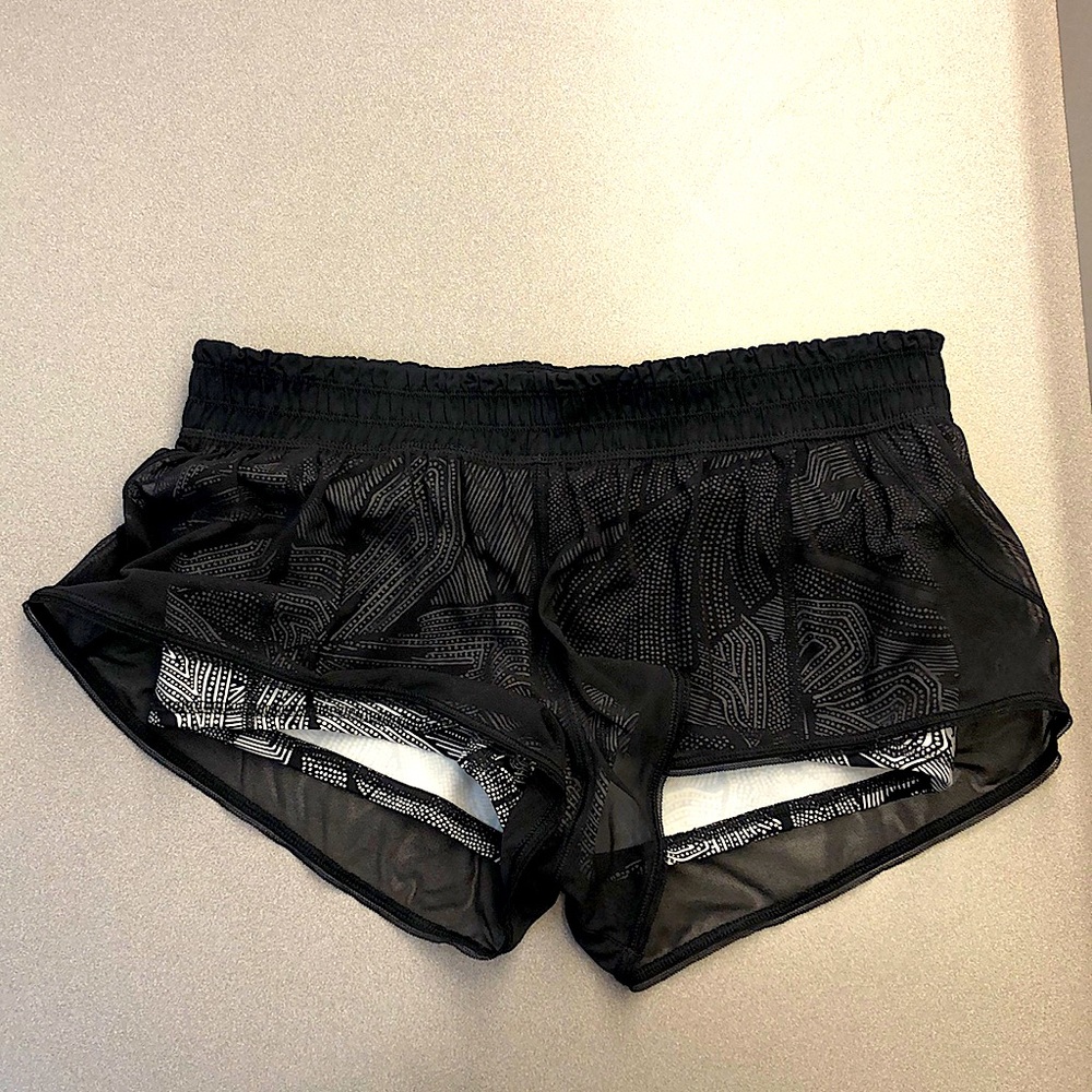 Lululemon women’s shorts size 8 black mesh overlay w/ black & white print under